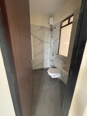 Bathroom in 2 BHK Apartment at Raunak City, Kalyan West – for Sale