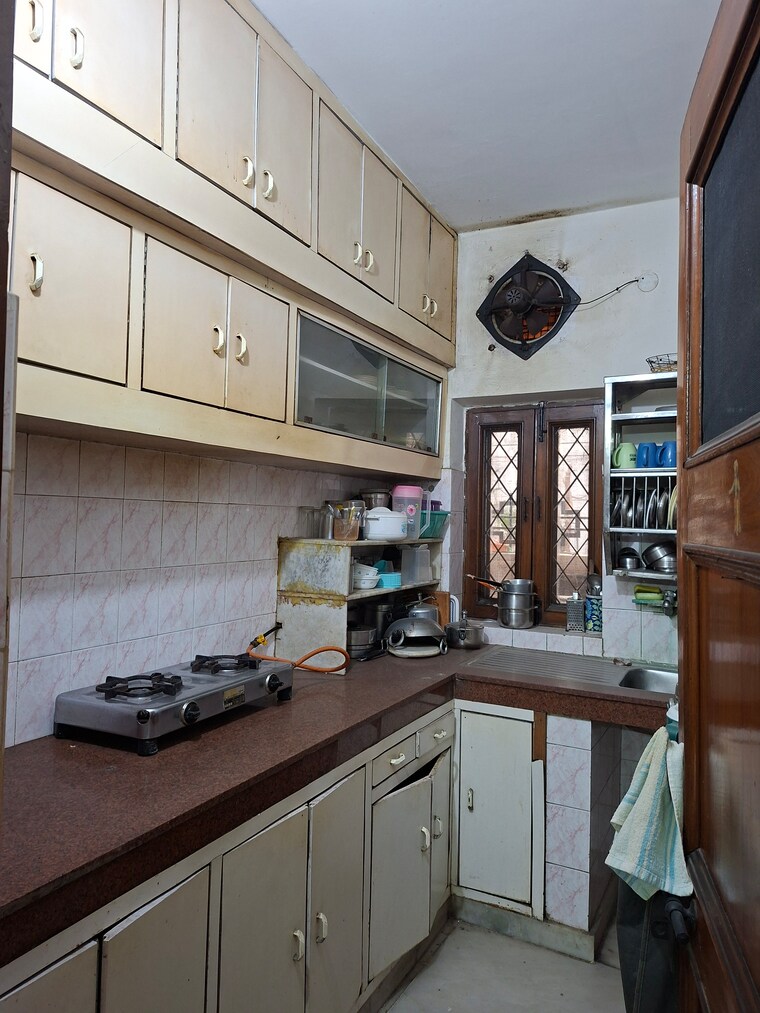 Kitchen, rwa-apartments-sector-19 6 Bedroom 112 Sq.Mt. Independent House In Sector 19 Noida 9699986