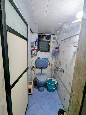 Bathroom in 1 BHK Apartment at Tilak Bhavana CHS, Tilak Nagar – for Rent