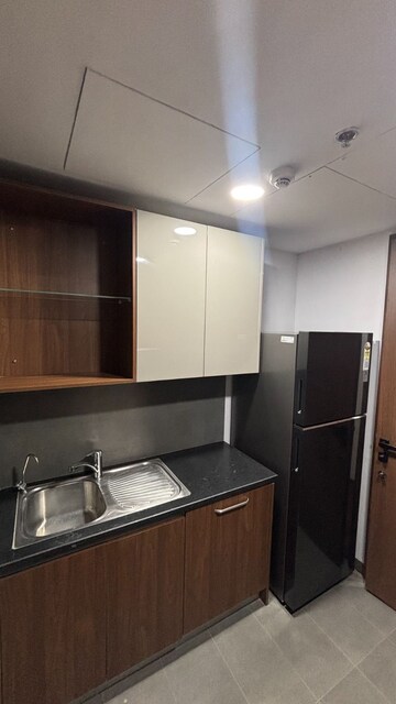 Kitchen in 2 BHK Apartment at Krisumi Waterfall Residences, Sector 36a – for Rent