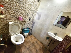 Bathroom in 3 BHK Builder Floor at Dhakoli – for Sale