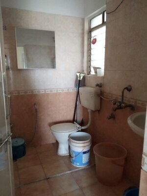 Bathroom in 3 BHK Apartment at Ravetkar Arihant Shree, Dahanukar Colony – for Rent