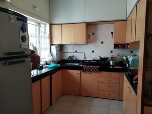 Kitchen in 3 BHK Apartment at Ravetkar Arihant Shree, Dahanukar Colony – for Rent