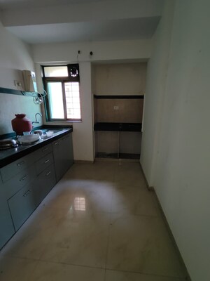 Kitchen in 1 BHK Apartment at Rajaram Sukur Sapphire, Ghodbunder Road – for Rent