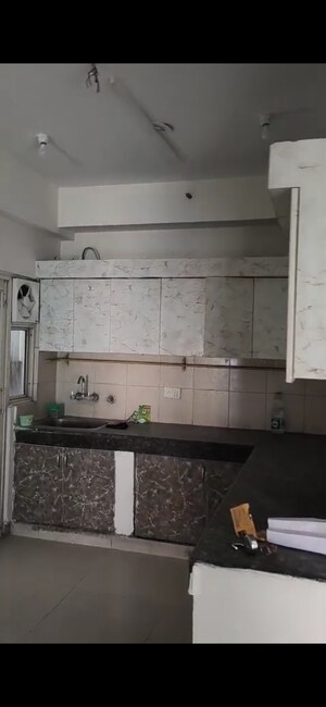 Kitchen in 2.5 BHK Apartment at Panchsheel Greens II, Sector 16 Greater Noida – for Sale