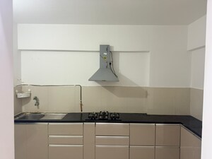 Kitchen in 3 BHK Apartment at Pride World City Kingsbury, Charholi Budruk – for Rent