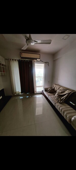 Living Room in 3 BHK Apartment at Rosa Bella, Ghodbunder Road – for Rent
