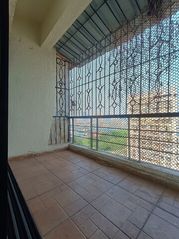 Balcony in 3 BHK Apartment at Shree Balaji Satyam Towers, Kopar Khairane – for Rent
