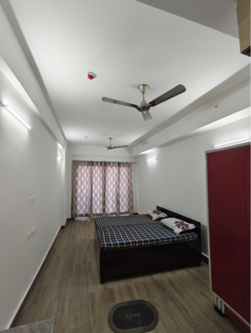 Bedroom in Studio Apartment at Gaur Runway Suites, Gaur Yamuna City – for Rent