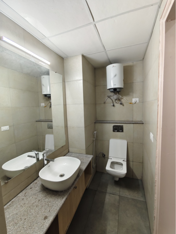 Bathroom, gaur-runway-suites Studio 460 Sq.Ft. Apartment In Gaur Yamuna City Greater Noida 9702003
