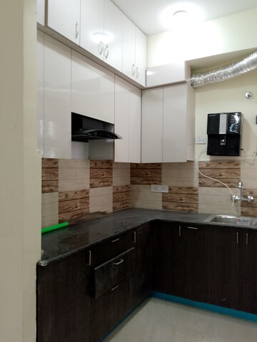 Kitchen in 2 BHK Apartment at Amrapali Enchante, Tech Zone 4 Greater Noida – for Rent