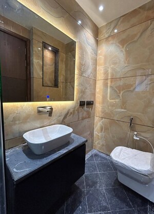 Bathroom in 4 BHK Builder Floor at Sushant Lok I – for Rent