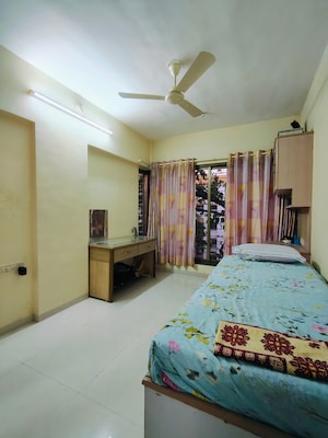 Bedroom in 2 BHK Apartment at Chikoowadi – for Sale