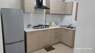 Kitchen in 2 BHK Apartment at Bhartiya Nikoo Homes, Thanisandra Main Road – for Rent
