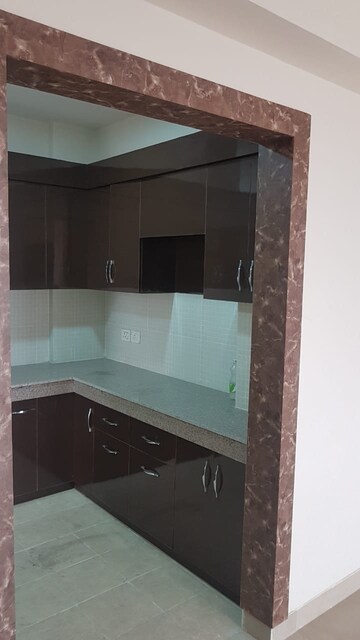 Kitchen in 3 BHK Apartment at Eros Sampoornam, Sector 2 Greater Noida – for Rent