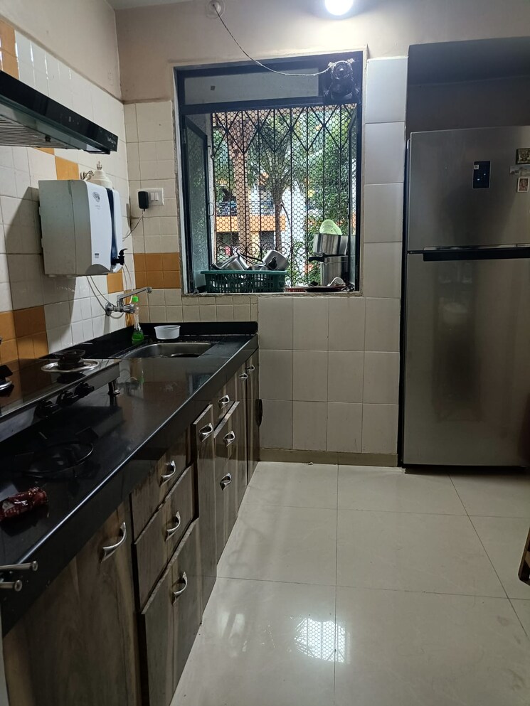 Kitchen, cosmos-park 1 Bedroom 610 Sq.Ft. Apartment In Ghodbunder Road Thane 9702322