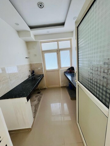 Kitchen in 2 BHK Apartment at River Heights Plaza, Raj Nagar Extension – for Rent