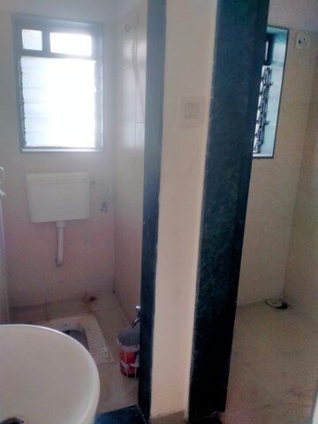 Bathroom in 1 BHK Apartment at Raunak Unnathi Woods Phase 7 A And B, Ghodbunder Road – for Rent
