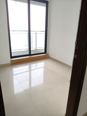 Room in 2.5 BHK Apartment at Rustomjee Elanza, Malad West – for Sale