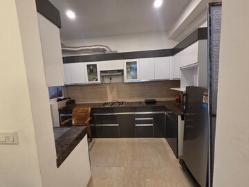 Kitchen in 3 BHK Apartment at Omaxe The Palace, Gomti Nagar – for Sale