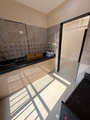 Kitchen in 2 BHK Apartment at Evershine Nagar – for Rent