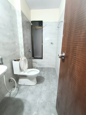 Bathroom in 2 BHK Apartment at Dosti Group Imperia, Manpada – for Rent