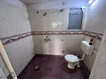 Bathroom in 2 BHK Apartment at Sunshree Woods, Nibm Road – for Rent