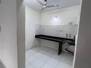 Kitchen in 2 BHK Apartment at Sunshree Woods, Nibm Road – for Rent