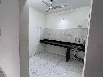 Kitchen in 2 BHK Apartment at Sunshree Woods, Nibm Road – for Rent