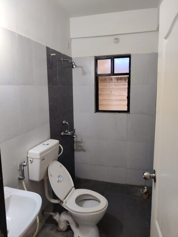 Bathroom in 2 BHK Penthouse at Amrut Runwal Daffodils, Nibm – for Rent