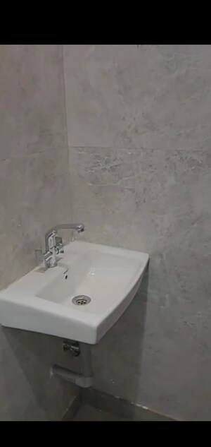 Bathroom in 3 BHK Builder Floor at Mahavir Enclave – for Sale