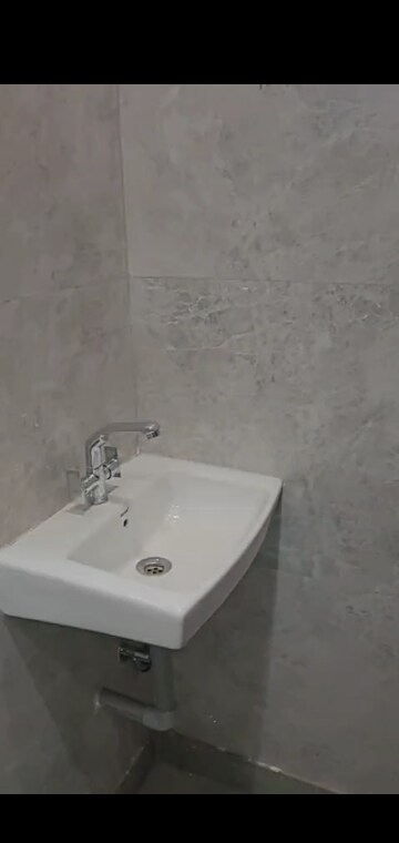 Bathroom in 3 BHK Builder Floor at Mahavir Enclave – for Sale