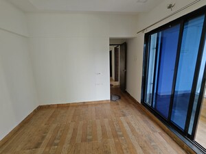 Room in 2 BHK Apartment at Tulsi Aura Mumbai, Ghansoli – for Rent