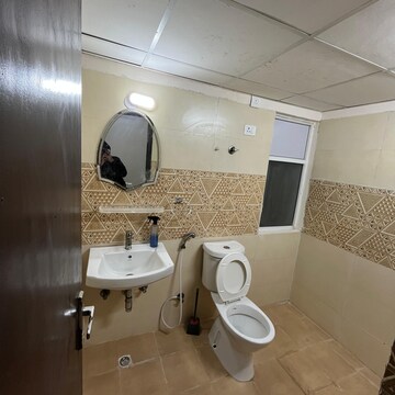 Bathroom in 1 BHK Apartment at Gaur 14th Avenue High Street, Panchsheel Green – for Rent