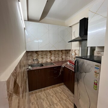 Kitchen in 1 BHK Apartment at Gaur 14th Avenue High Street, Panchsheel Green – for Rent