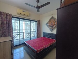 Bedroom in 2 BHK Apartment at Tulsi Aura Mumbai, Ghansoli – for Rent