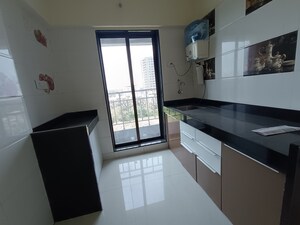 Kitchen in 2 BHK Apartment at Kauls Heritage City Apartment, Vasai West – for Sale