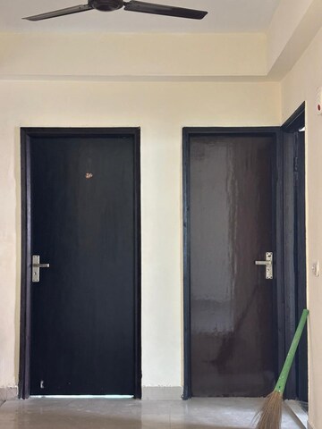 Building Lobby in 2 BHK Apartment at Sikka Karmic Greens, Sector 78 – for Rent