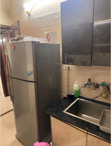 Kitchen in 3 BHK Apartment at Apex Anuradha Apartments, Paschim Vihar – for Rent