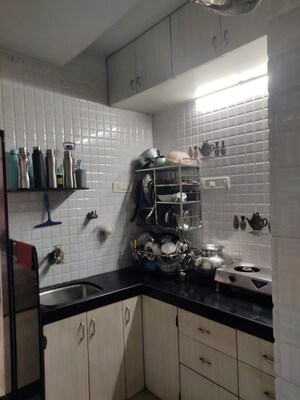 Kitchen in 1 BHK Apartment at Om CHS Santacruz, Santacruz East – for Sale