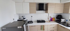 Kitchen in 2 BHK Apartment at Bhartiya City Nikoo Homes II, Thanisandra Main Road – for Rent