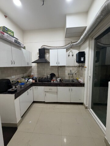 Kitchen in 3.5 BHK Apartment at Amrapali Silicon City, Sector 76 – for Sale