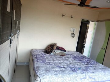 Bedroom in 2 BHK Apartment at Asmita Jyoti CHS, Malad West – for Rent