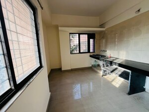 Kitchen in 1 BHK Apartment at Wadgaon Sheri – for Rent