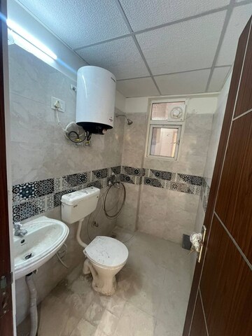 Bathroom in 2 BHK Apartment at Freedom Fighters Enclave – for Rent