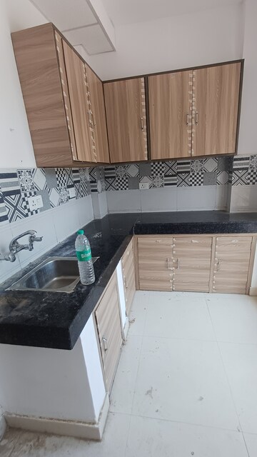 Kitchen in 1.5 BHK Apartment at Signature The Serenas, Sohna Sector 36 – for Sale