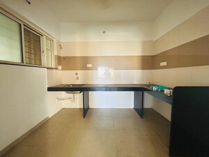 Kitchen in 2 BHK Apartment at Paranjape Madhukosh Phase III, Dhayari – for Rent