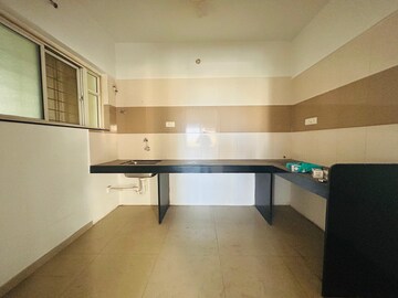 Kitchen in 2 BHK Apartment at Paranjape Madhukosh Phase III, Dhayari – for Rent