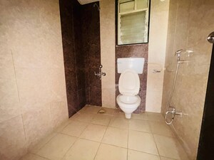 Bathroom in 2 BHK Apartment at Paranjape Madhukosh Phase III, Dhayari – for Rent
