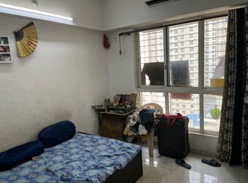 Living Room in 2 BHK Apartment at Lodha Amara, Kolshet Road – for Rent